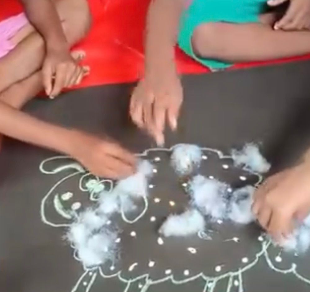 Children participating in an AET art camp activity