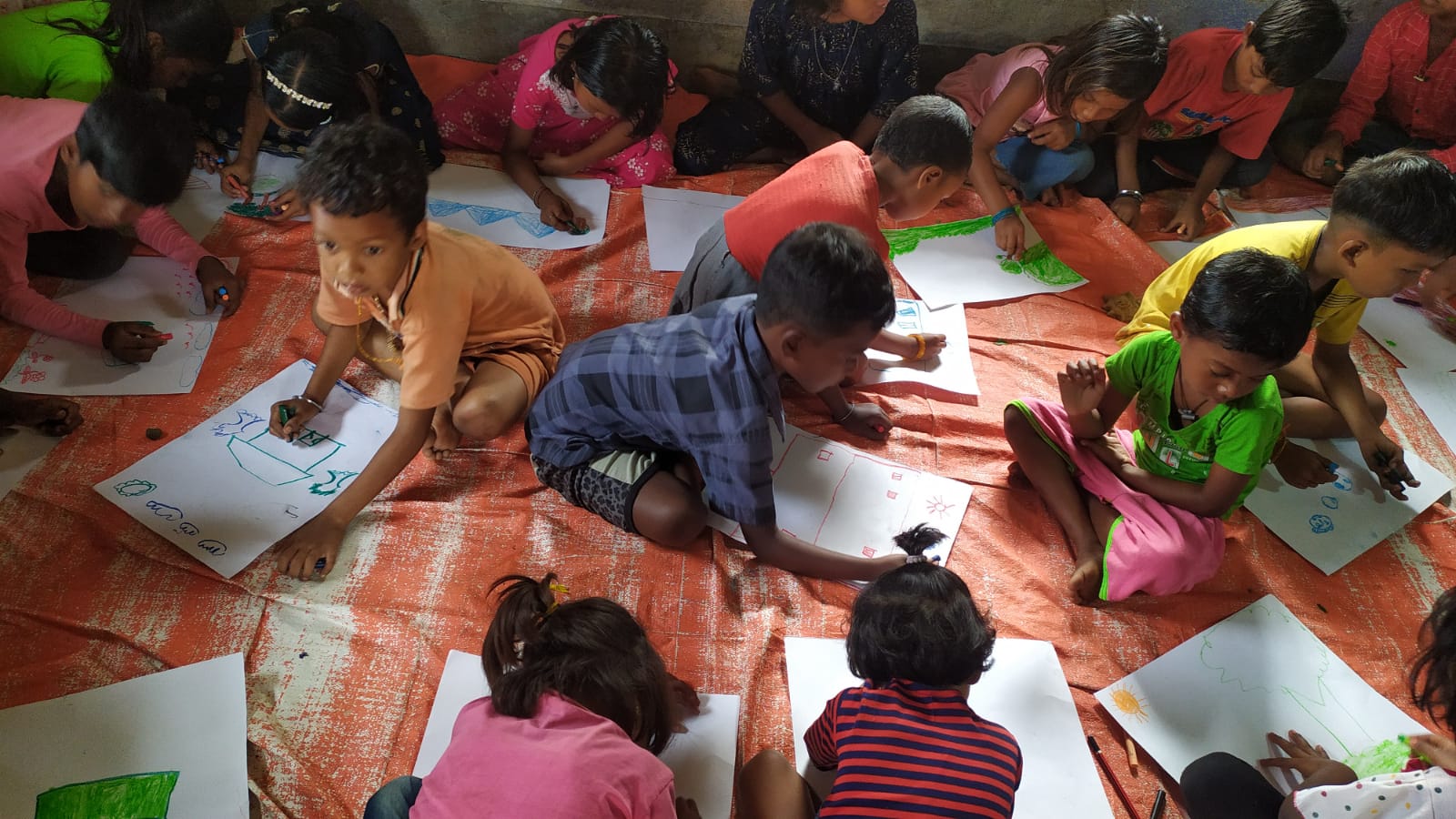 Children exploring creative activities at AET