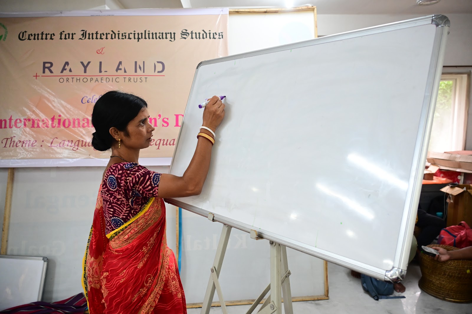 Workshop facilitator leading a classroom activity